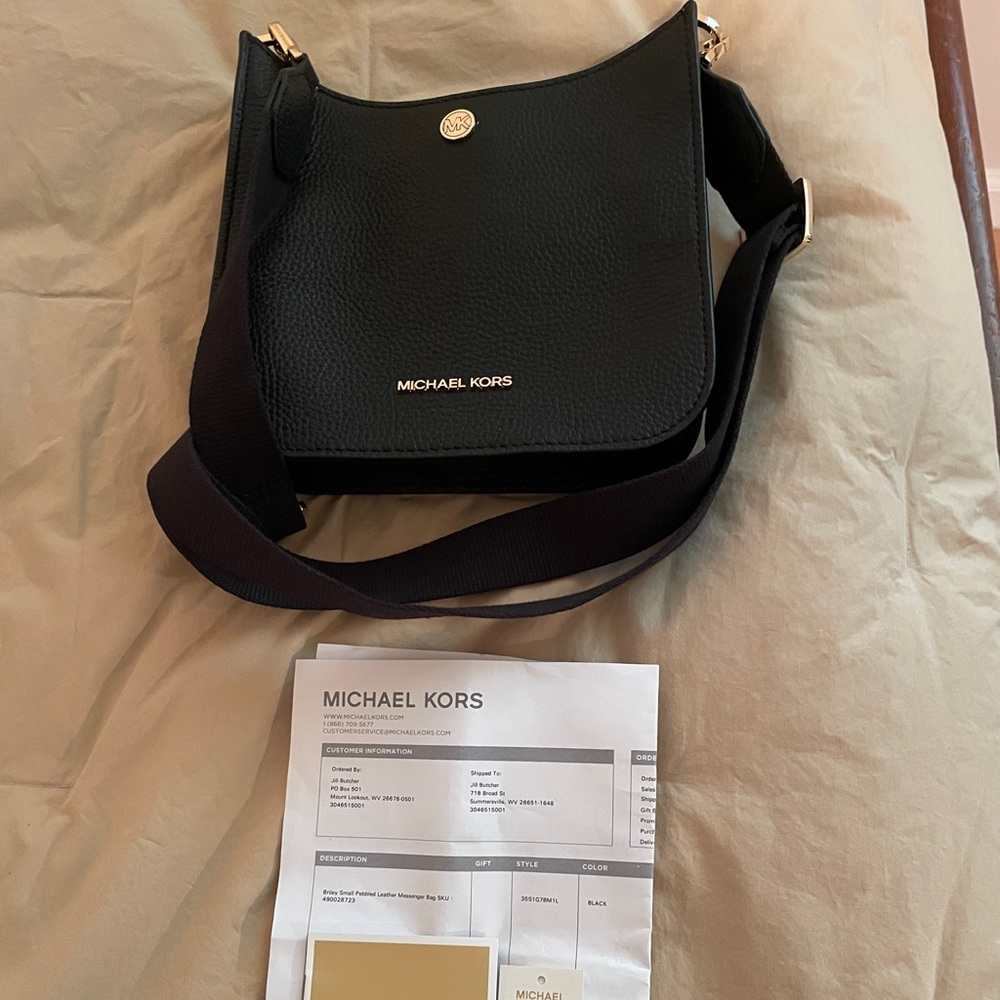 Michael Kors black leather Brinley crossbody messenger. Like new barely used